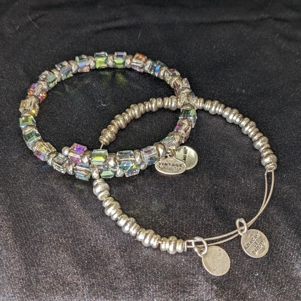 Sixty-Six Silver Bangle Bracelets by Alex and Ani